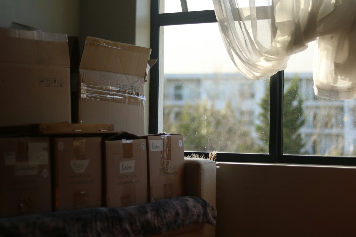 Cardboard boxes packed for house relocation in Pune