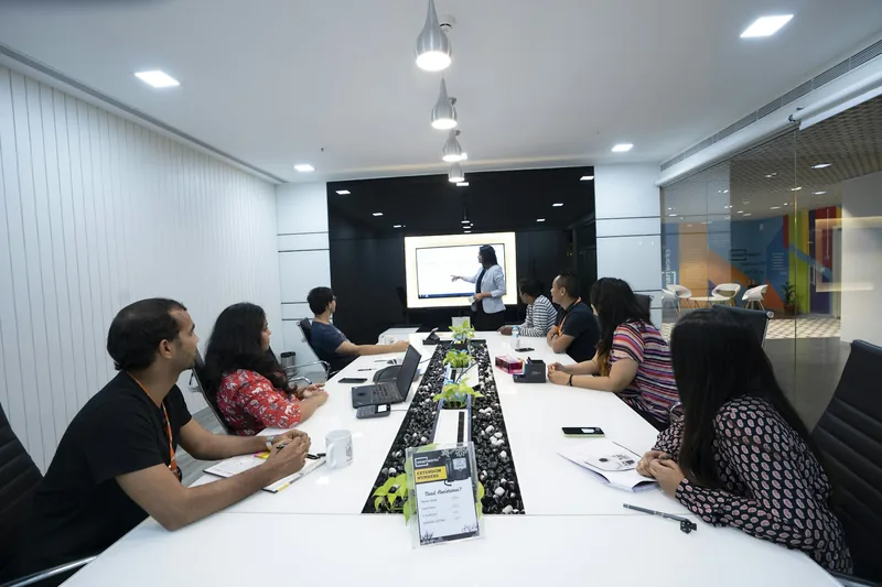 Client and web developer discussing website project scope